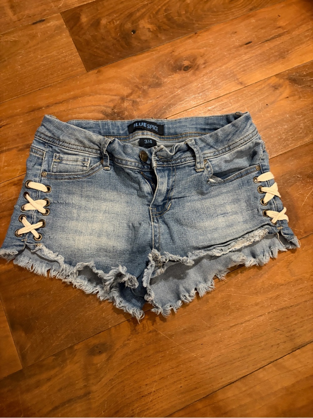 Blue Spice Light Blue Distressed Denim Shorts with Lace-Up Sides